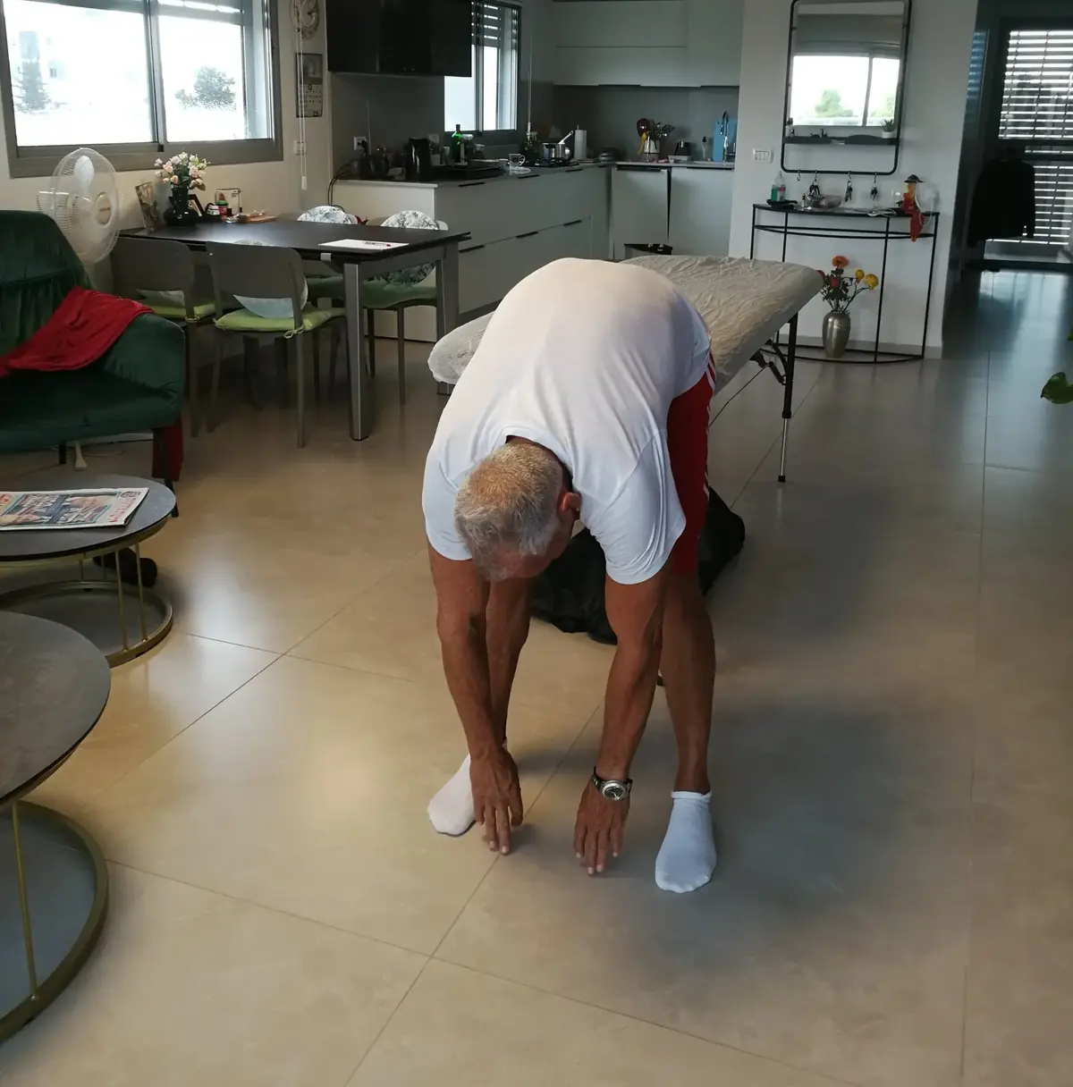 בדיקת תנועתיות וכיפוף עמוד השדרה בטיפול פאשיקום